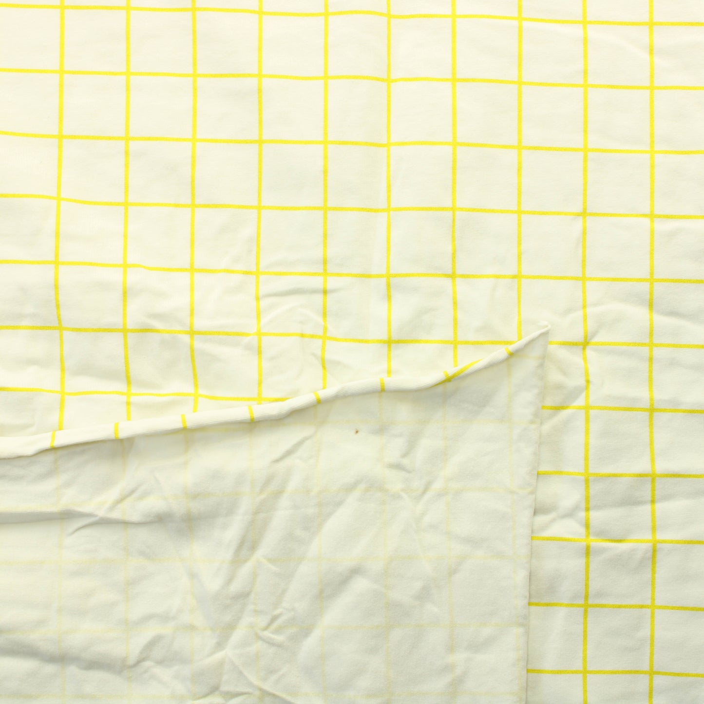 Keltavalkoinen ruutuvihko Trikoo - Pala