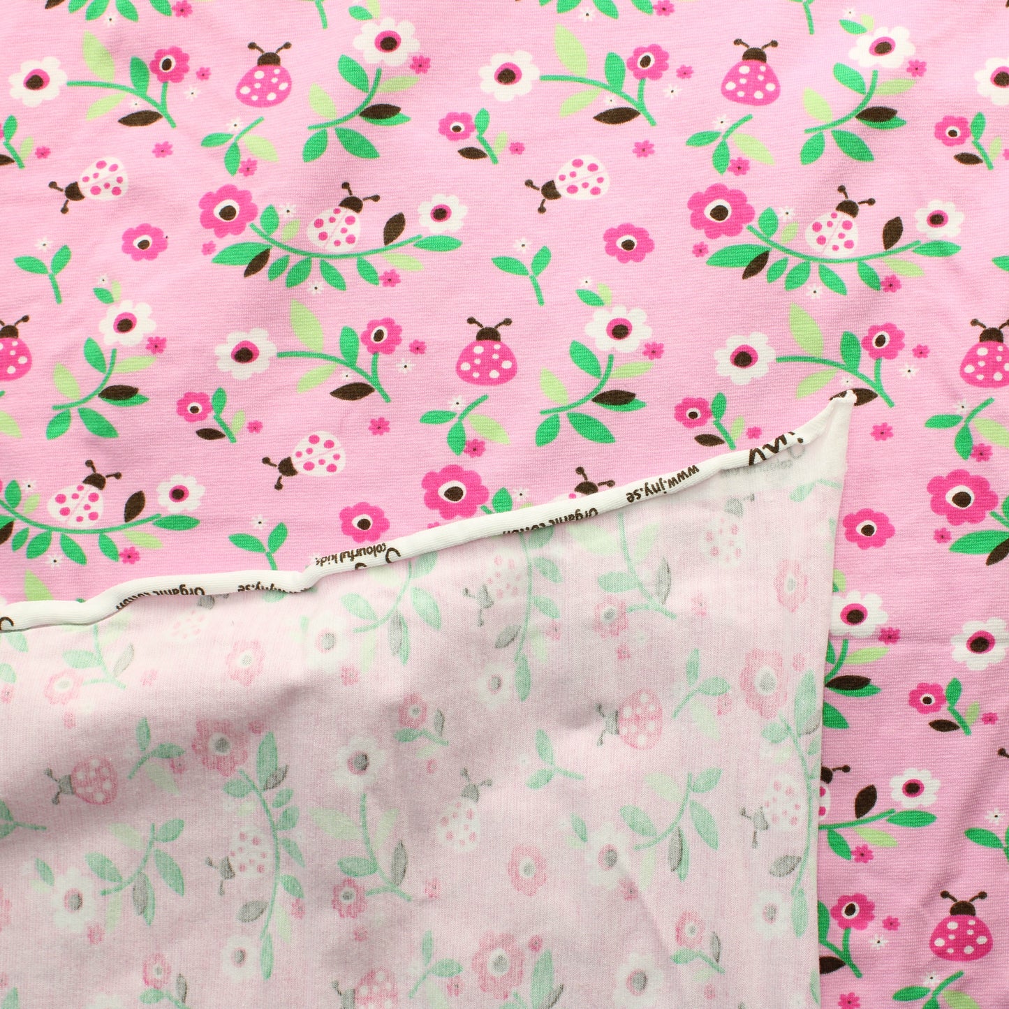 Leppikset ja kukat Trikoo - Pala