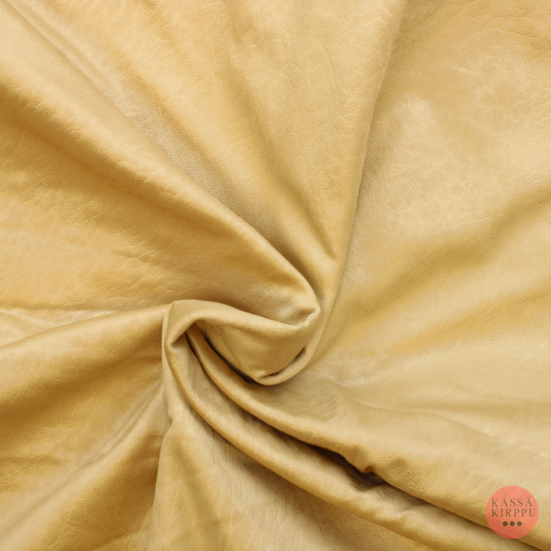 Kellertävä beige verkkarimainen nahkapinnan näköinen Vaatetuskangas - Pala