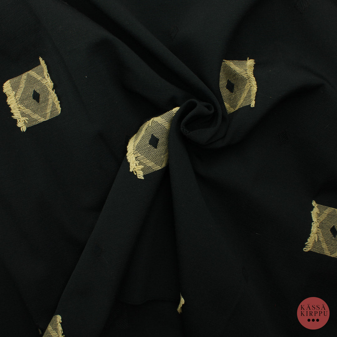 Musta beigekuvioinen Sisustuskangas - Pala