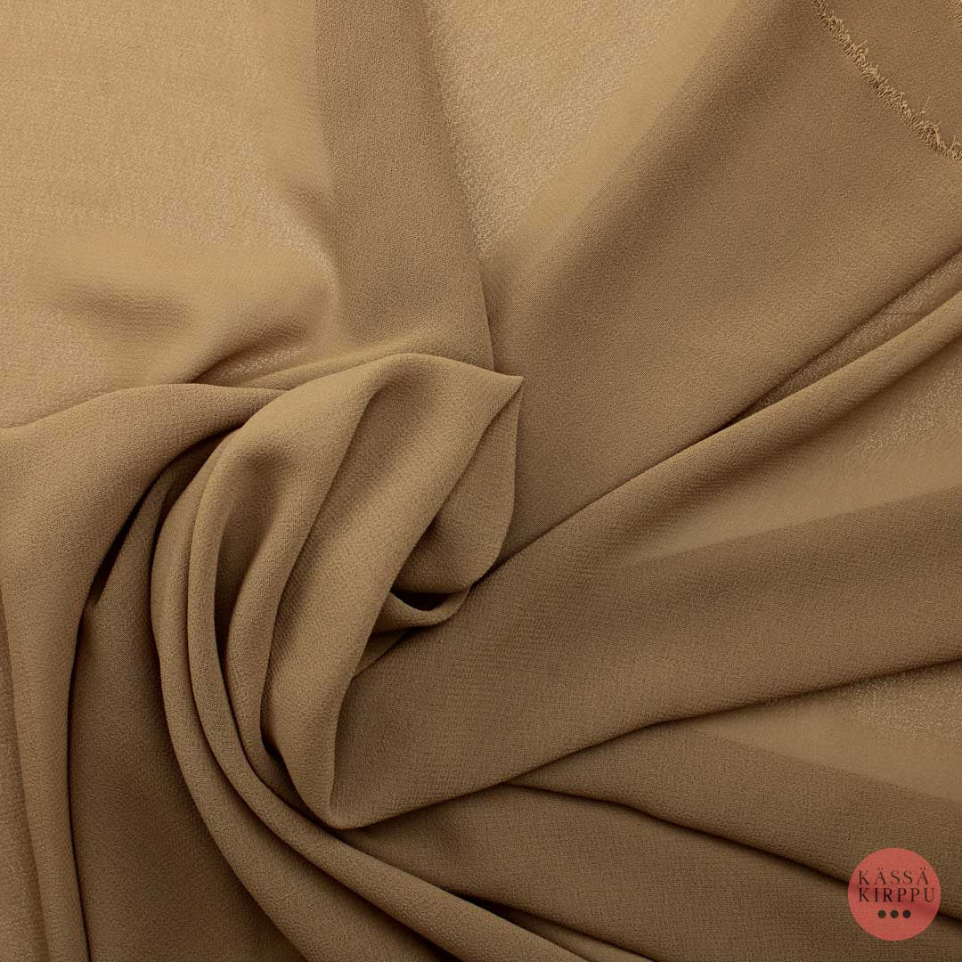 Beige kreppimäinen hiukan läpikuultava Vaatetuskangas - Pala