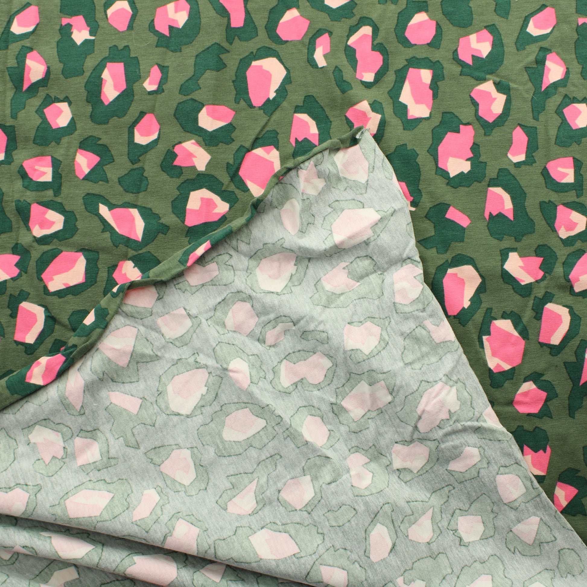 Pinkki-vihreä pantterin pilkku Trikoo - - Palapaketti