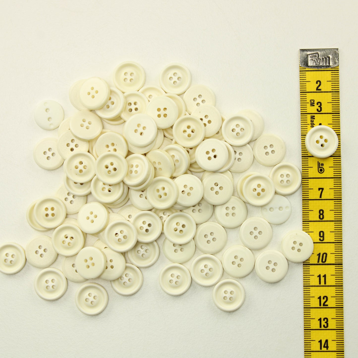 Luonnonvalkoiset muovinapit - Nappipussi