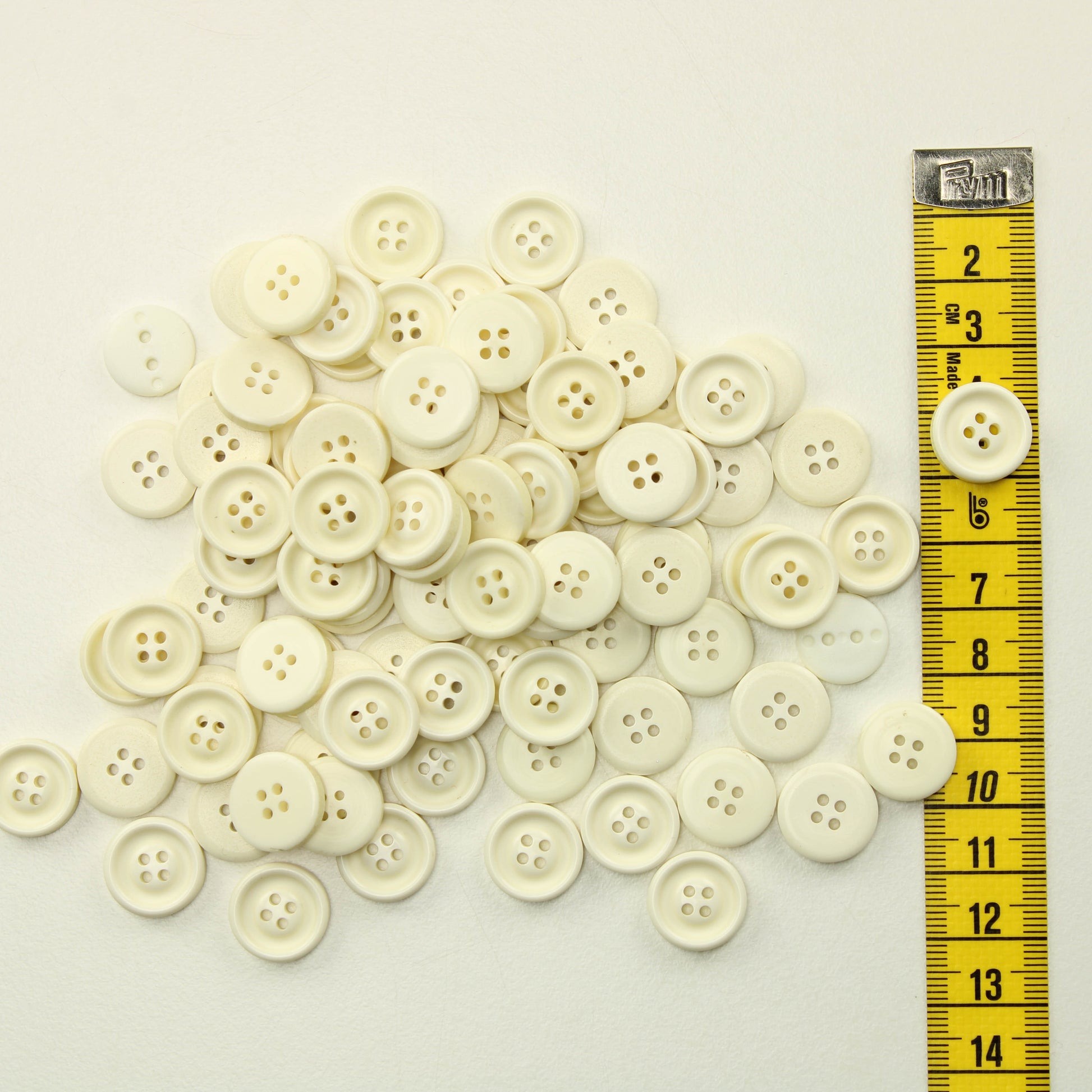 Luonnonvalkoiset muovinapit - Nappipussi