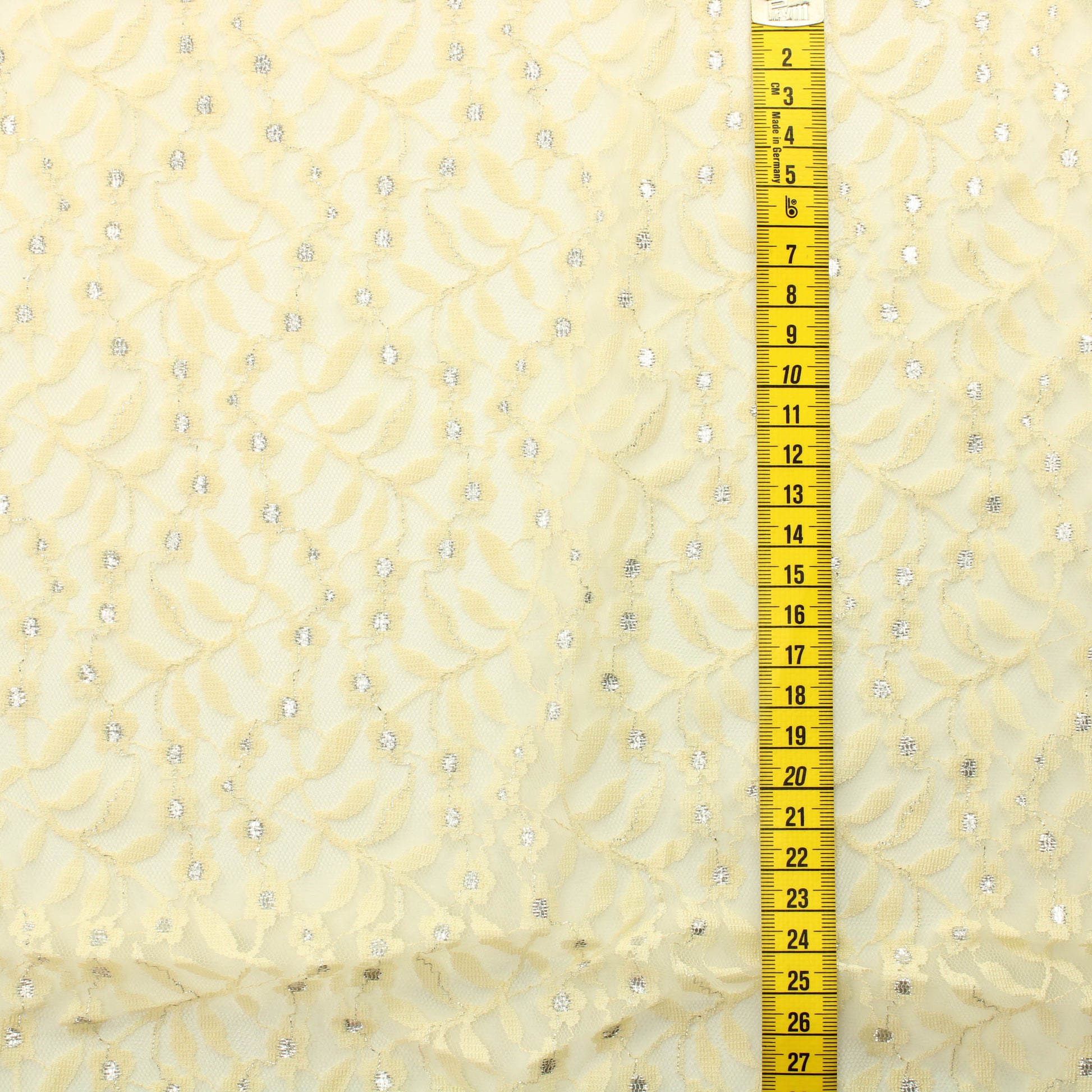 Keltainen hopeakoristeinen kukkaköynnös Pitsikangas - Pala