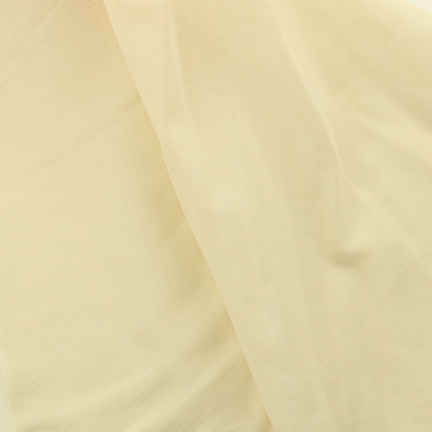 Vaaleankeltainen verkkomainen tekokuitu - Pala