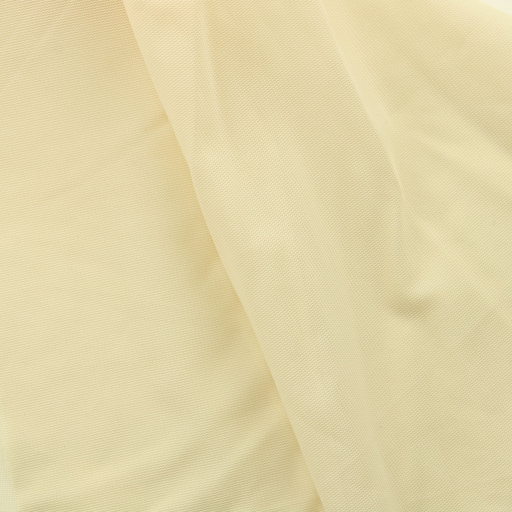 Vaaleankeltainen verkkomainen tekokuitu - Pala