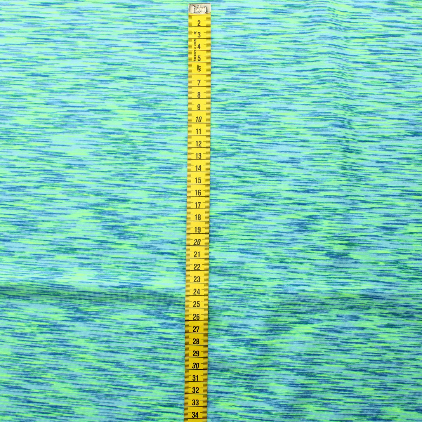 Monivärinen trikoomainen Neulos - Pala