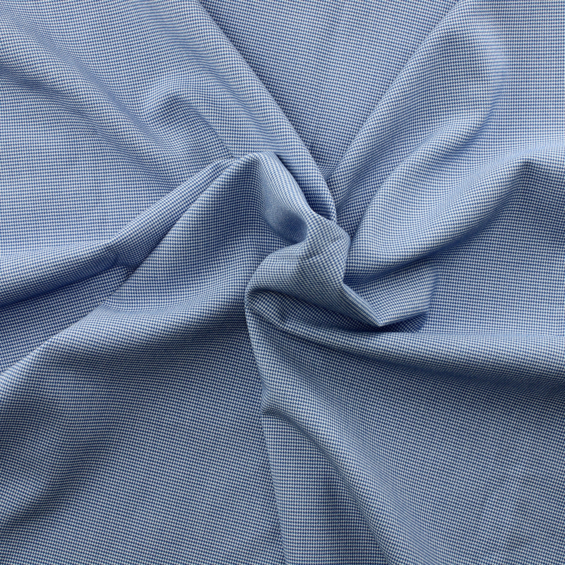 Sinivalkoinen pienikuvioinen Vaatetuskangas - Pala