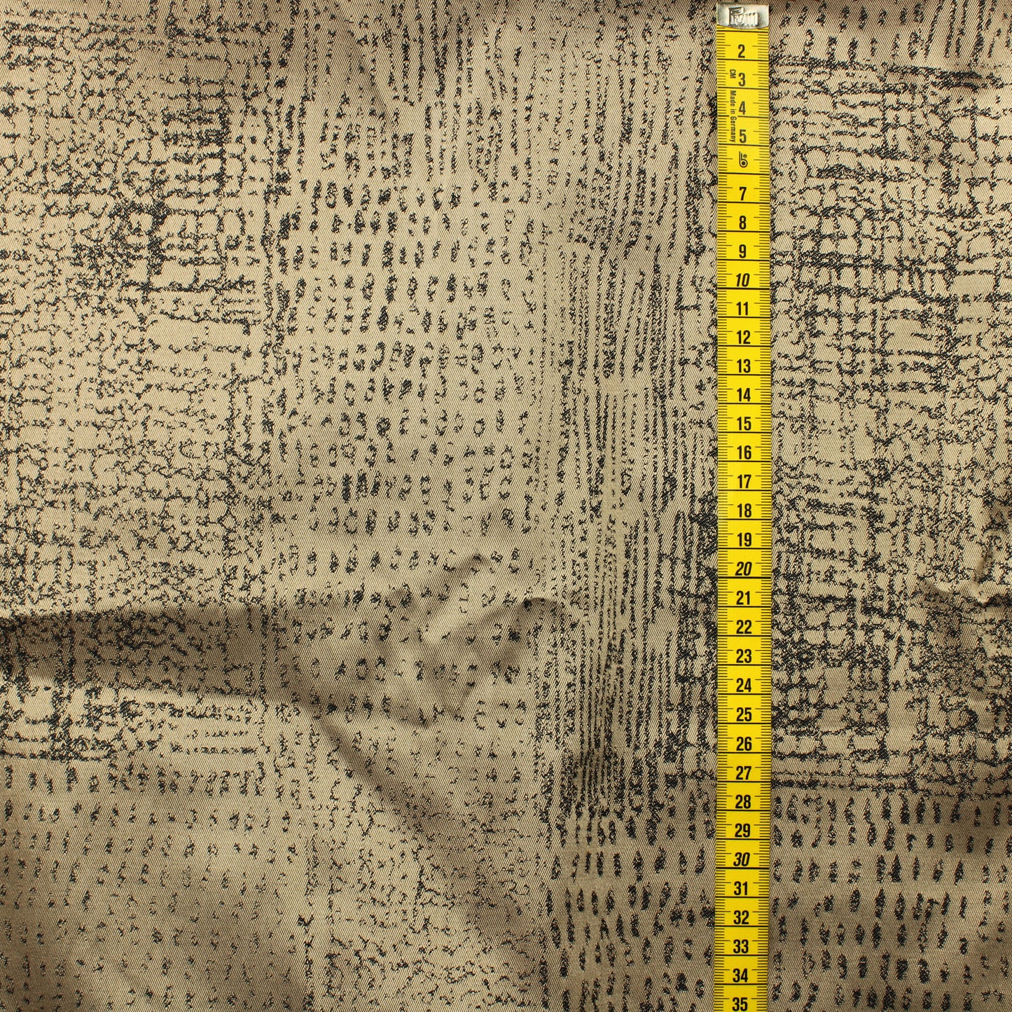 Hohtava tummakuvioinen Verhokangas - Palapaketti