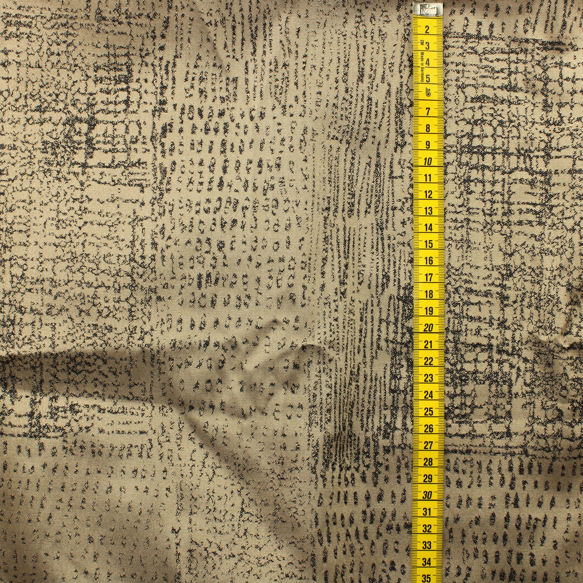 Hohtava tummakuvioinen Verhokangas - Palapaketti