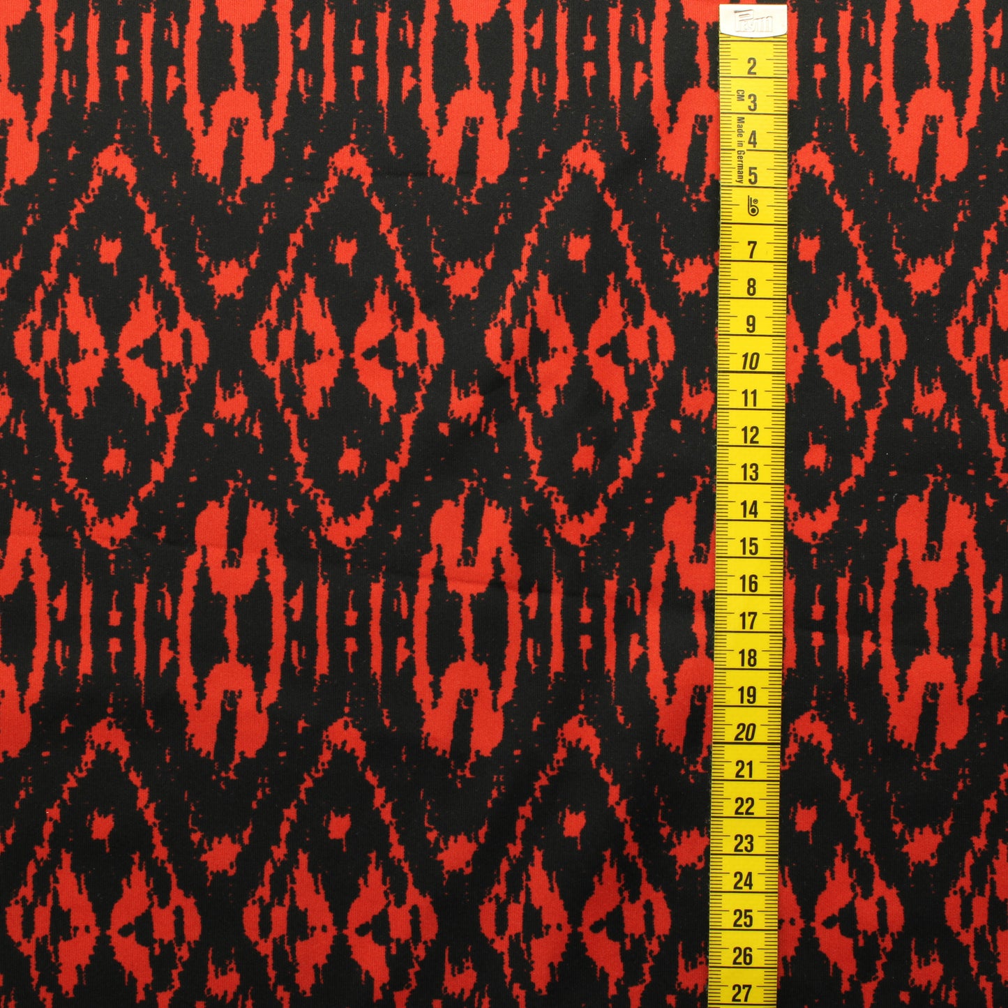 Puna-musta Neulos - Pala