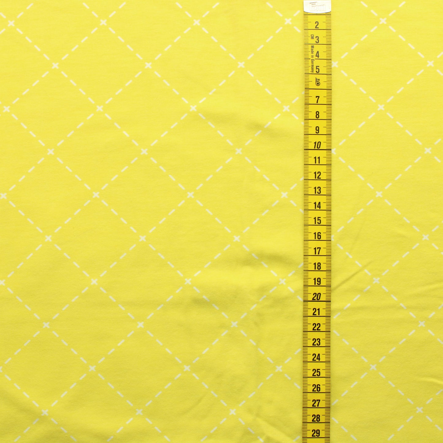 Tikatut neliöt keltaisella Trikoo - Pala