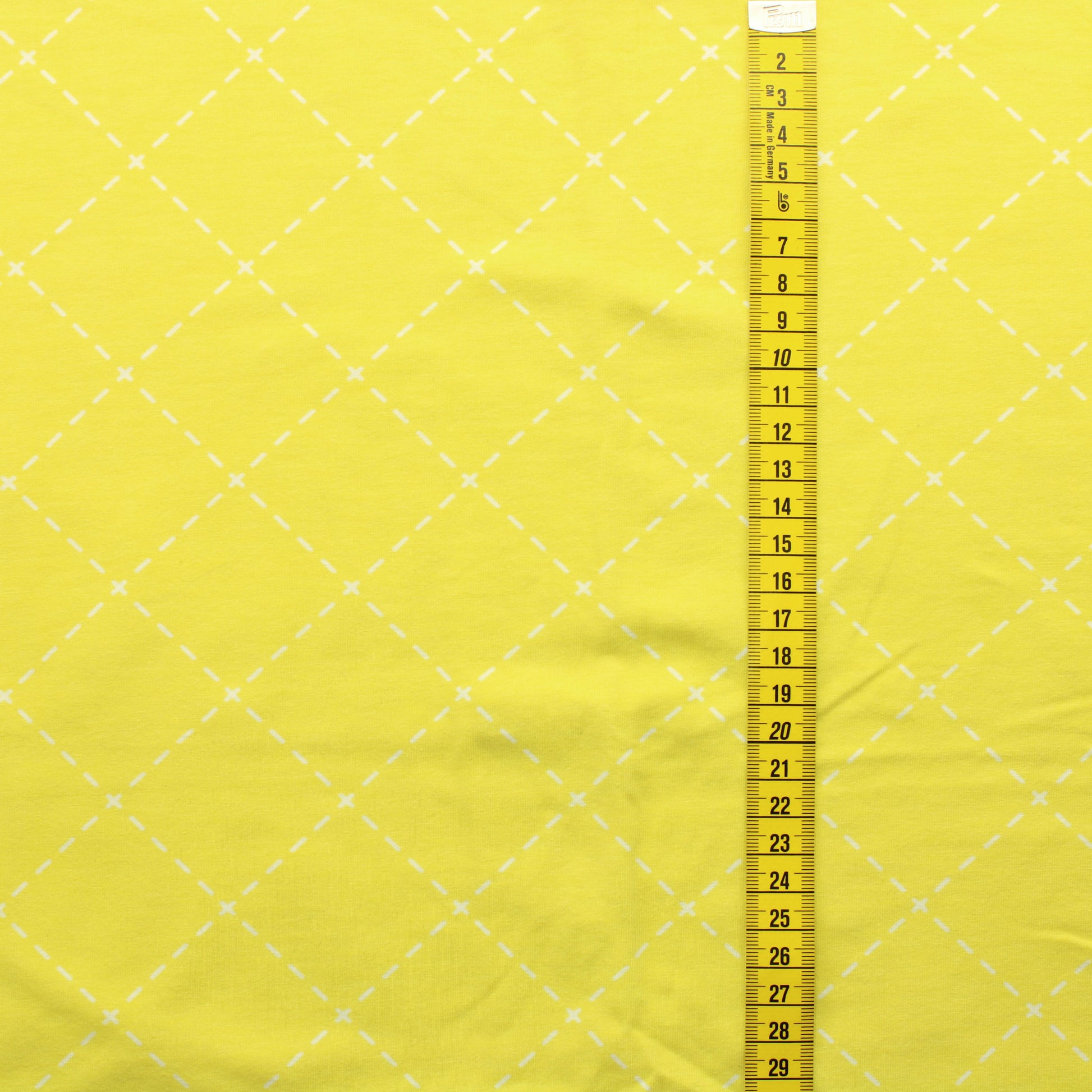 Tikatut neliöt keltaisella Trikoo - Pala