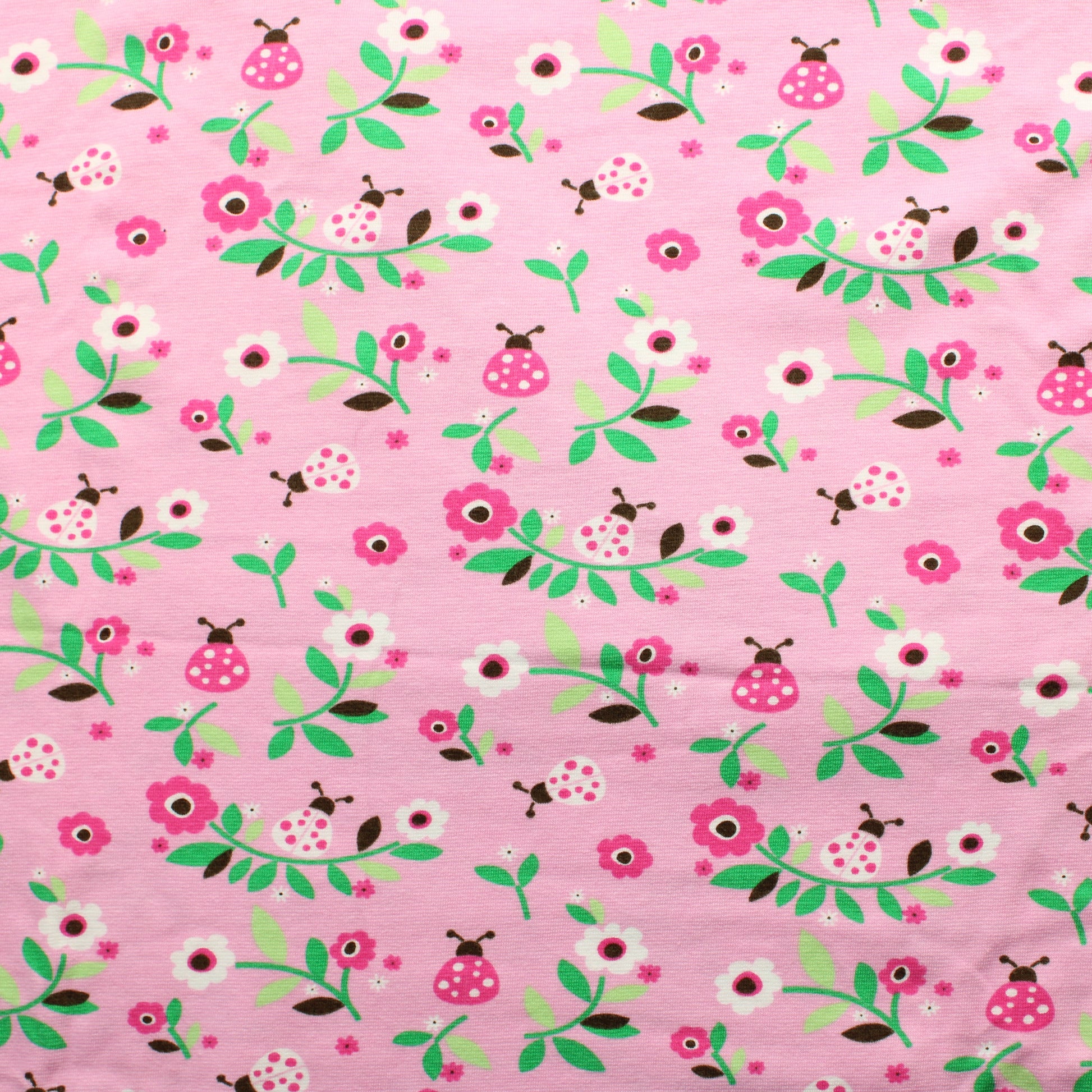 Leppikset ja kukat Trikoo - Pala