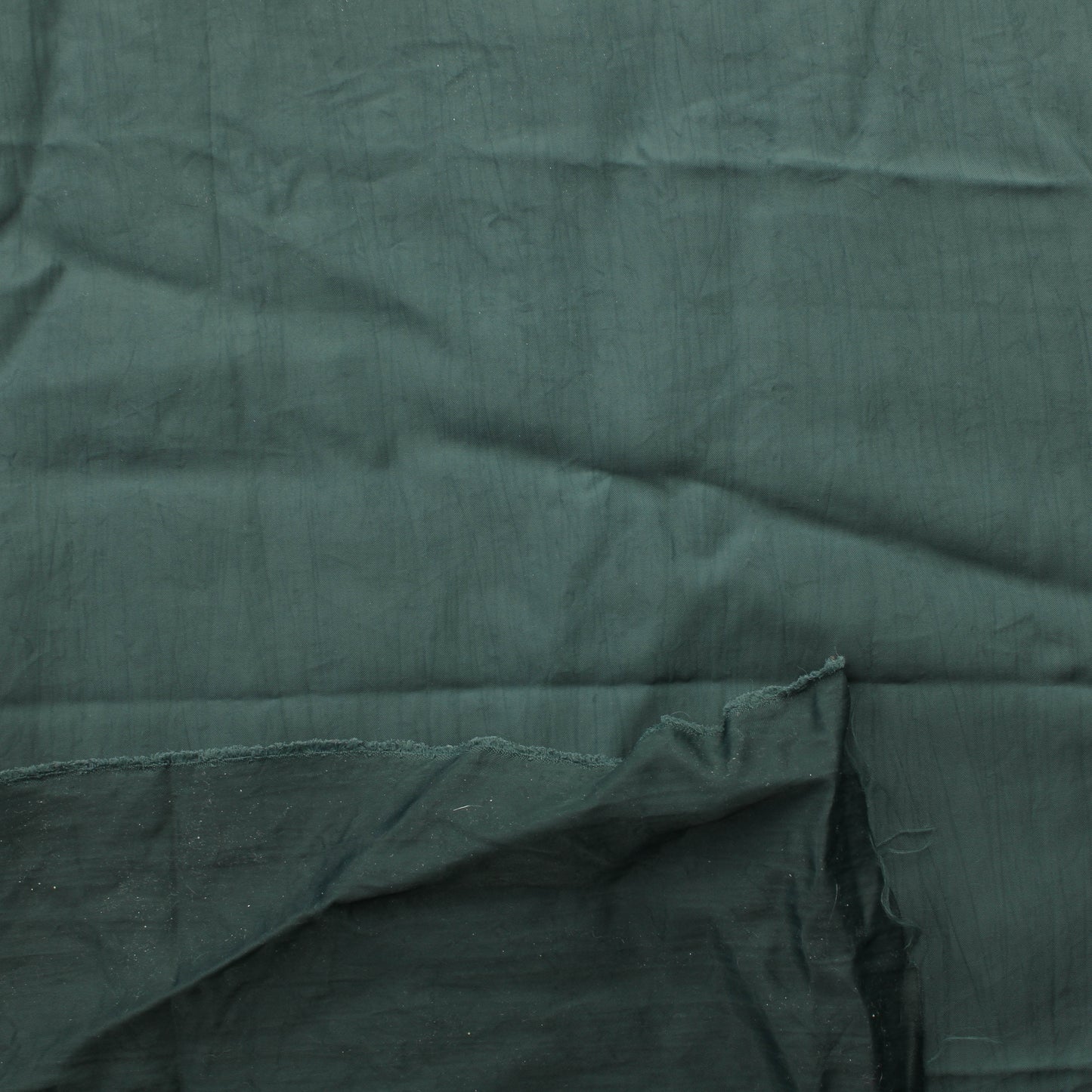 Tummanvihertävän harmaa Vaatetuskangas - Pala