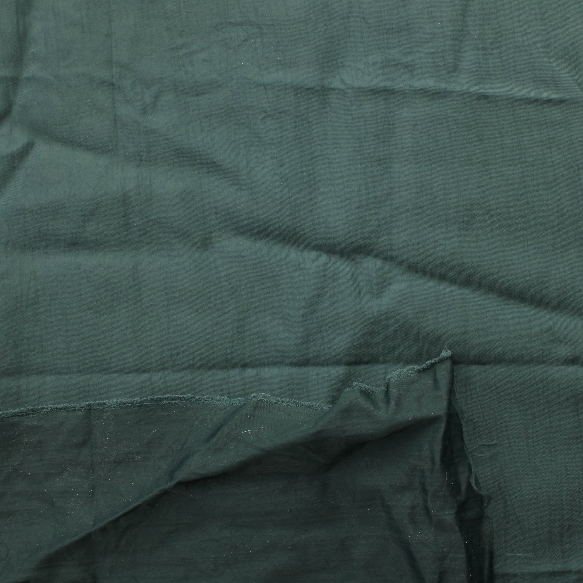 Tummanvihertävän harmaa Vaatetuskangas - Pala