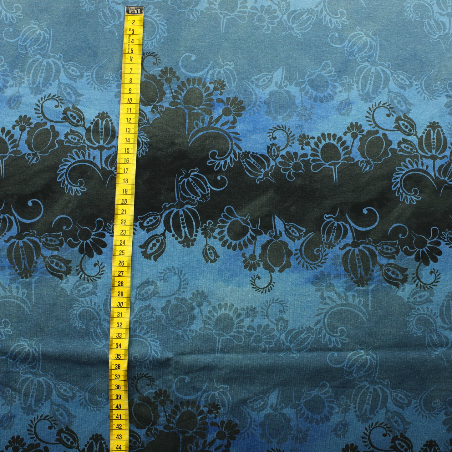 Kukkakuvioinen sinisävyinen Trikoo - Pala