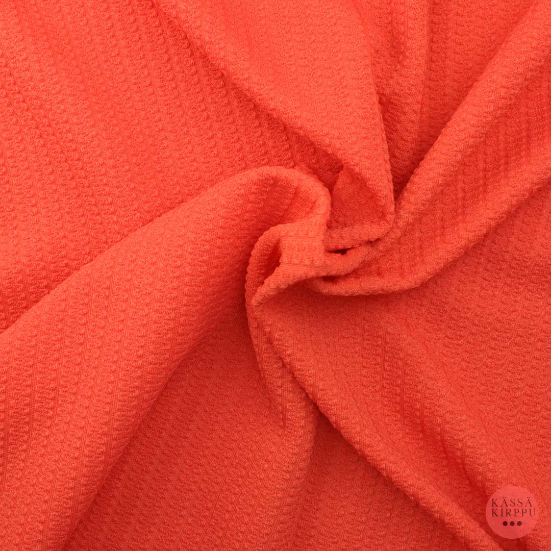 Oranssi neulosmainen pintakuvioitu kangas - Pala