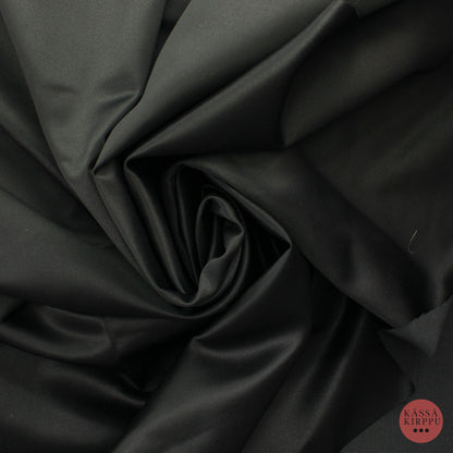 Musta kiiltäväpintainen tekokuitu - Pala